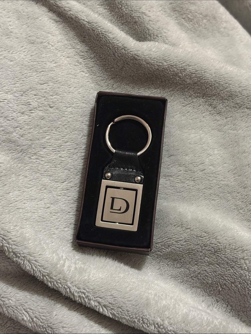 Danier Black Leather Keyring with Silver Logo Plate